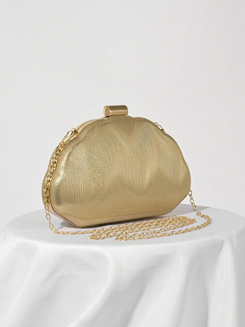 Bolsa Veneza – Escultura dourada em forma de elegância